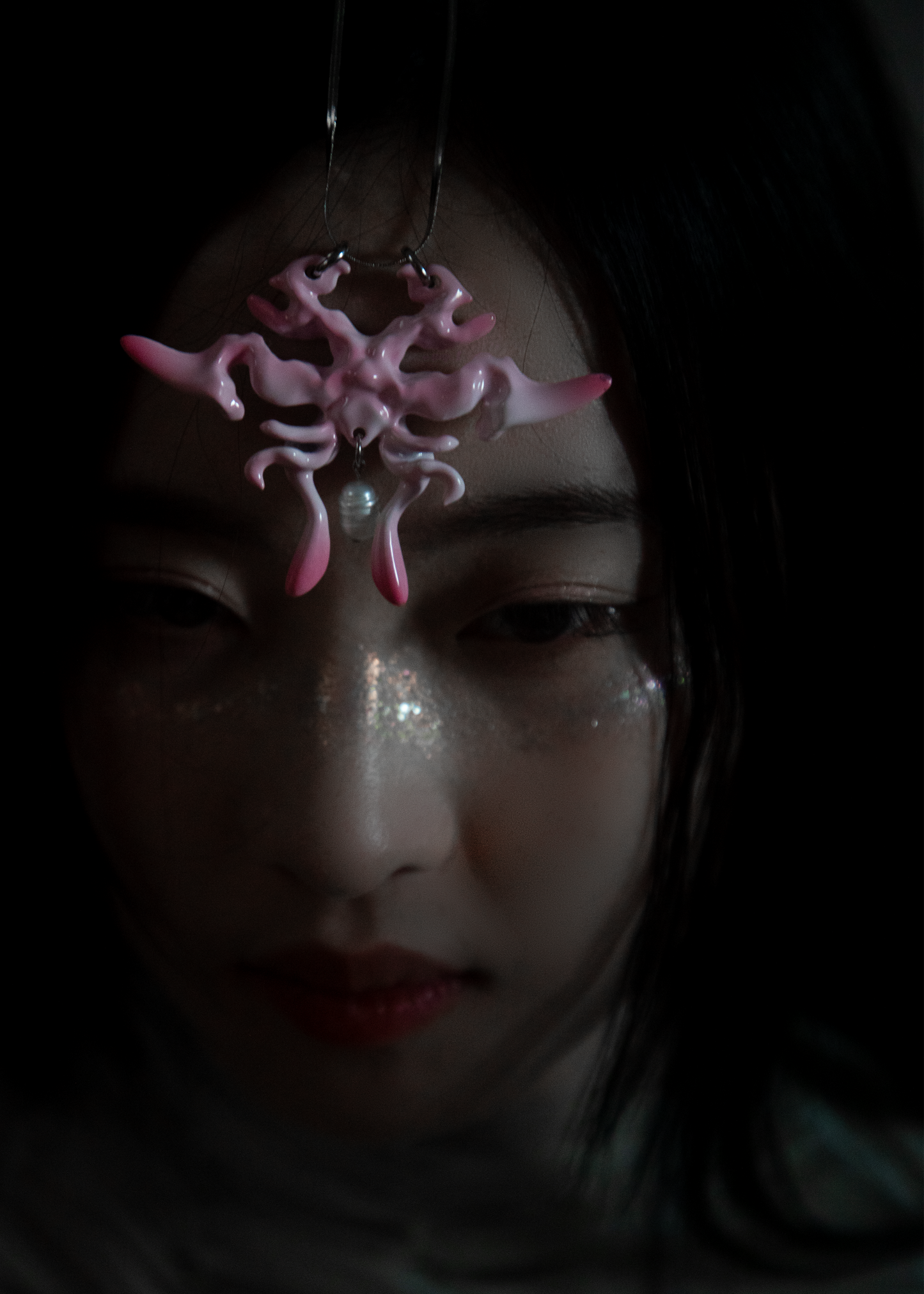 Model wearing 3D printed necklace earrings set with gradient cherry blossm pink finish